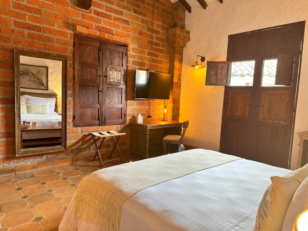 Postel nebo postele na pokoji v ubytování Casa Linaje Hotel Boutique - Cauca Viejo - Mayores de 10 años -
