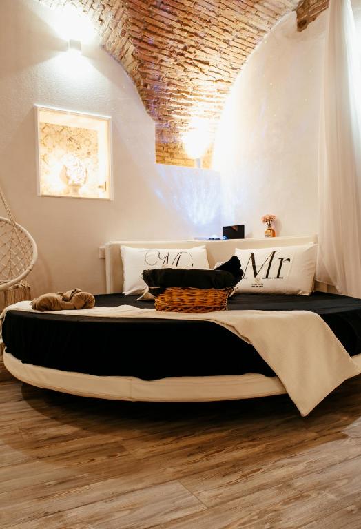 a bedroom with a large bed in a room at Casa Vacanze VENUS in Venosa