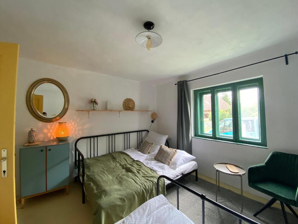 Postel nebo postele na pokoji v ubytování Bánhiday J70 Beach House