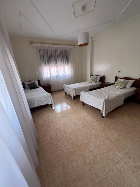 Postel nebo postele na pokoji v ubytování Appartement vue sur mer - Al Hoceima