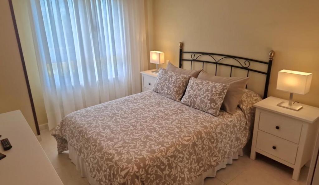 Cama o camas de una habitación en El Jardín de Amos