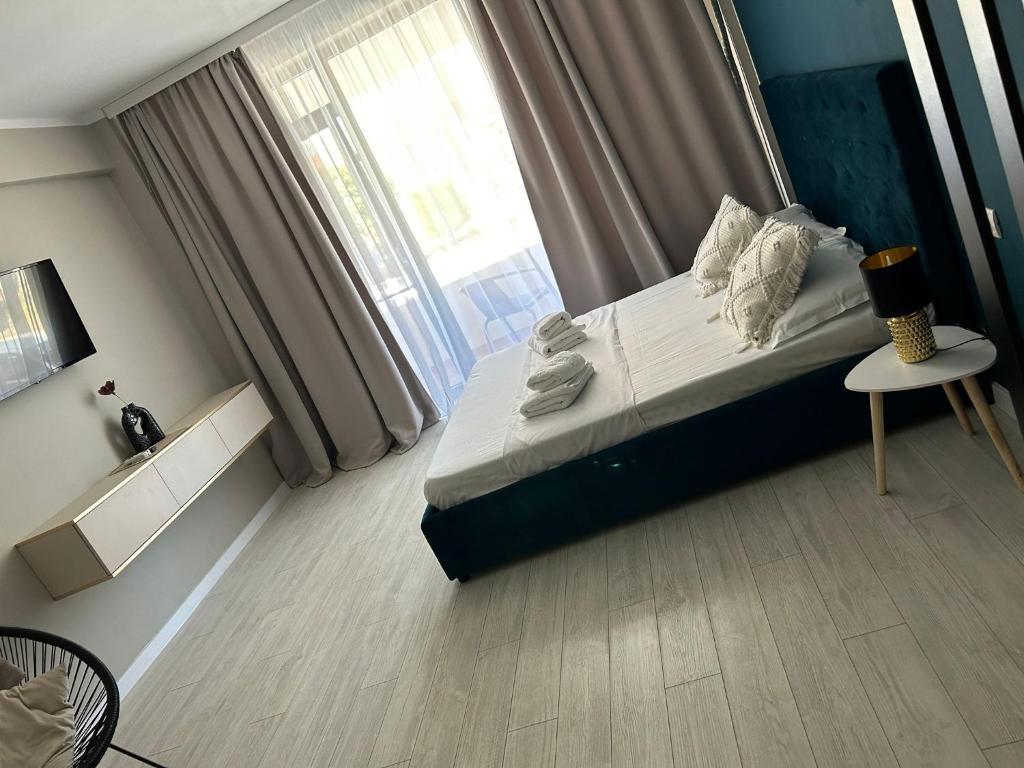 Ένα ή περισσότερα κρεβάτια σε δωμάτιο στο Bella studio-only adults