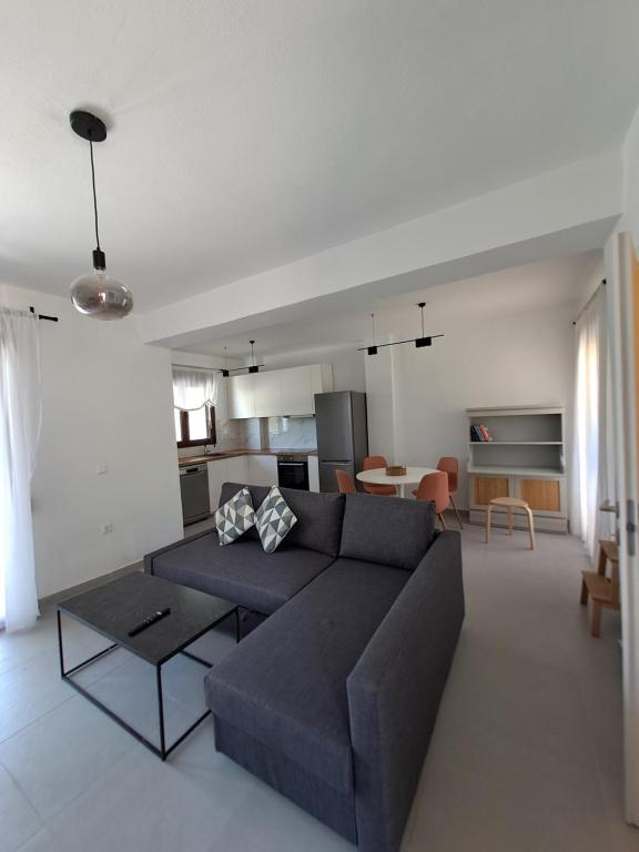 Posezení v ubytování Tessera - Exclusive Stylish Maisonette in Kriopigi