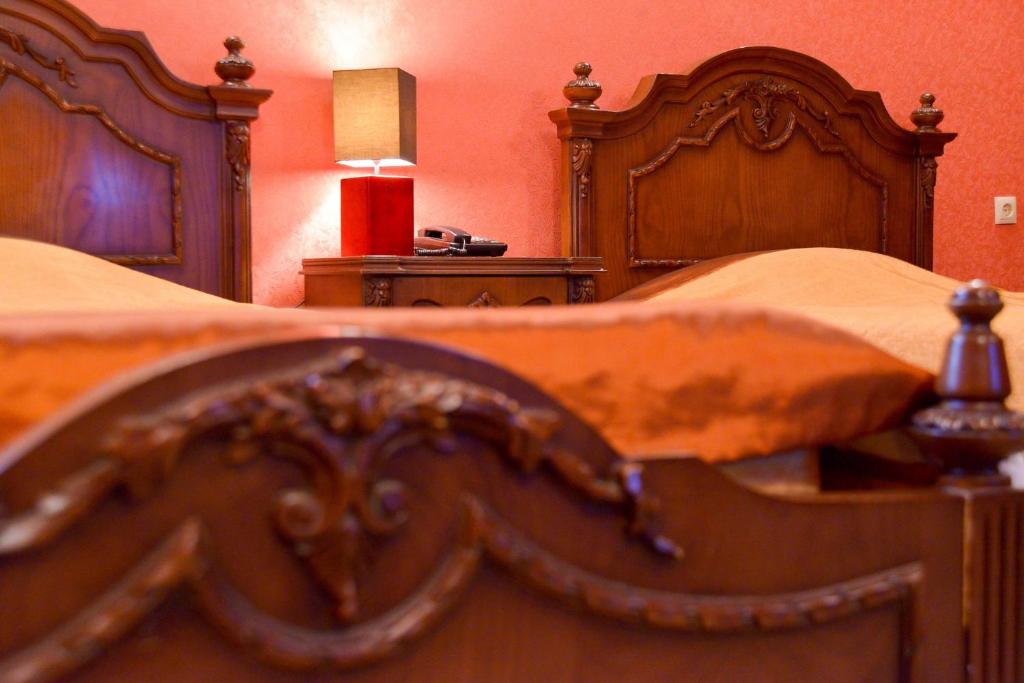 Postel nebo postele na pokoji v ubytování Hotel Old Town