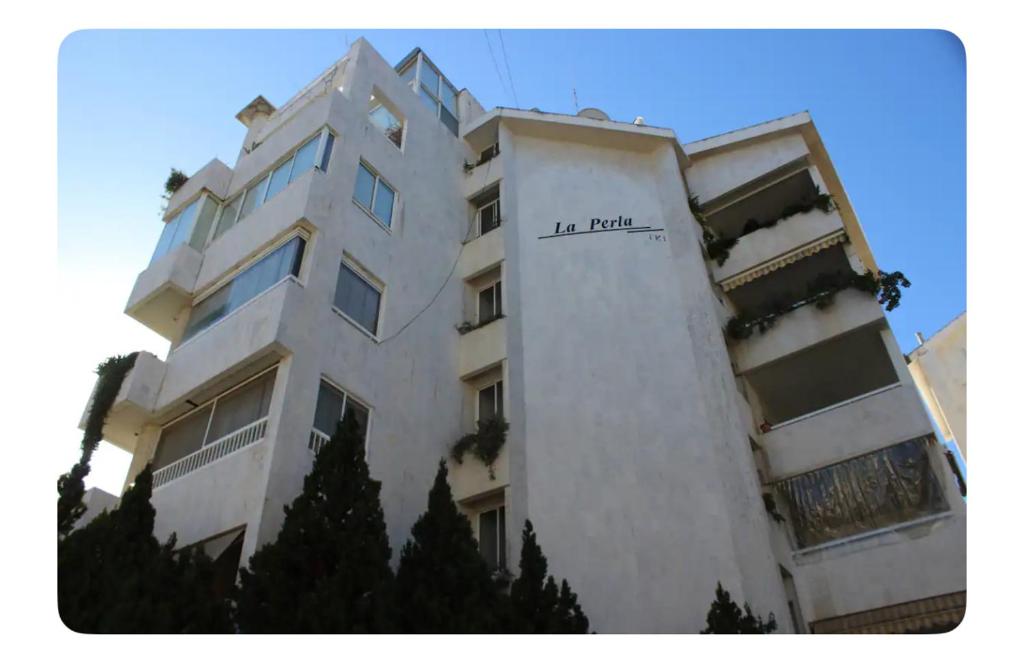 a white building with the words la fille on it at Luxury Apartment Koneytra 2 Bedrooms - 2 Baths in Bekfaya