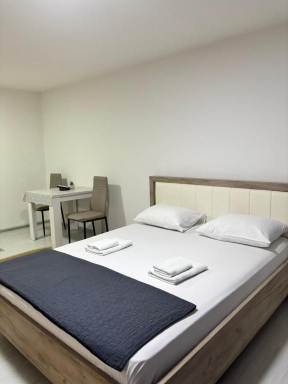 Postel nebo postele na pokoji v ubytování Apartman Sava