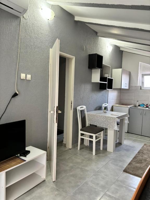 Kuchyň nebo kuchyňský kout v ubytování Apartman Sava