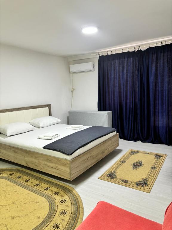 Postel nebo postele na pokoji v ubytování Apartman Sava