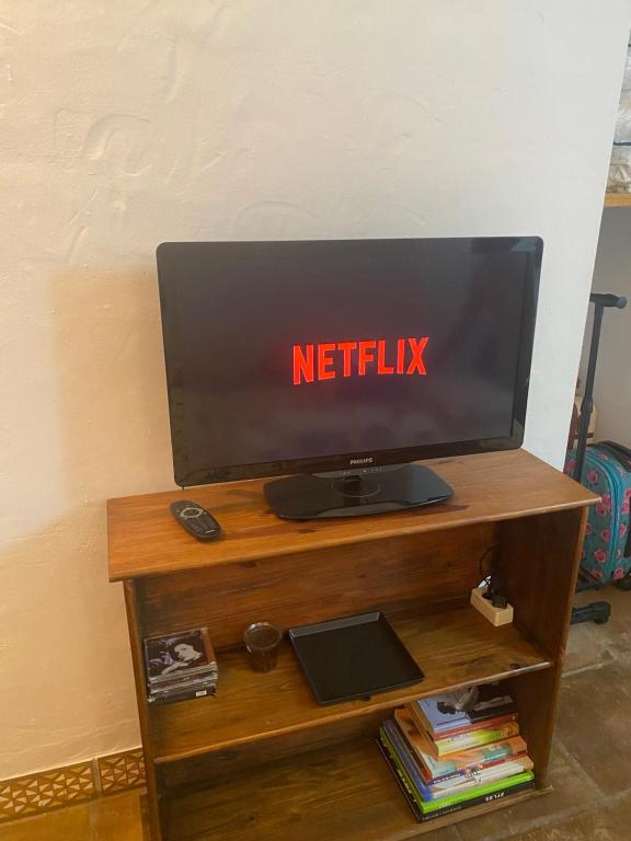 TV a/nebo společenská místnost v ubytování Cuarto encantador rústico