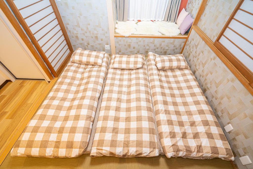 Asakusa,Ginza,Ueno,Skytree,Stn&Conv 1min ,Family suite,45 Mins to Airport,Kiyoka Villa 清禾客房内的一张或多张床位