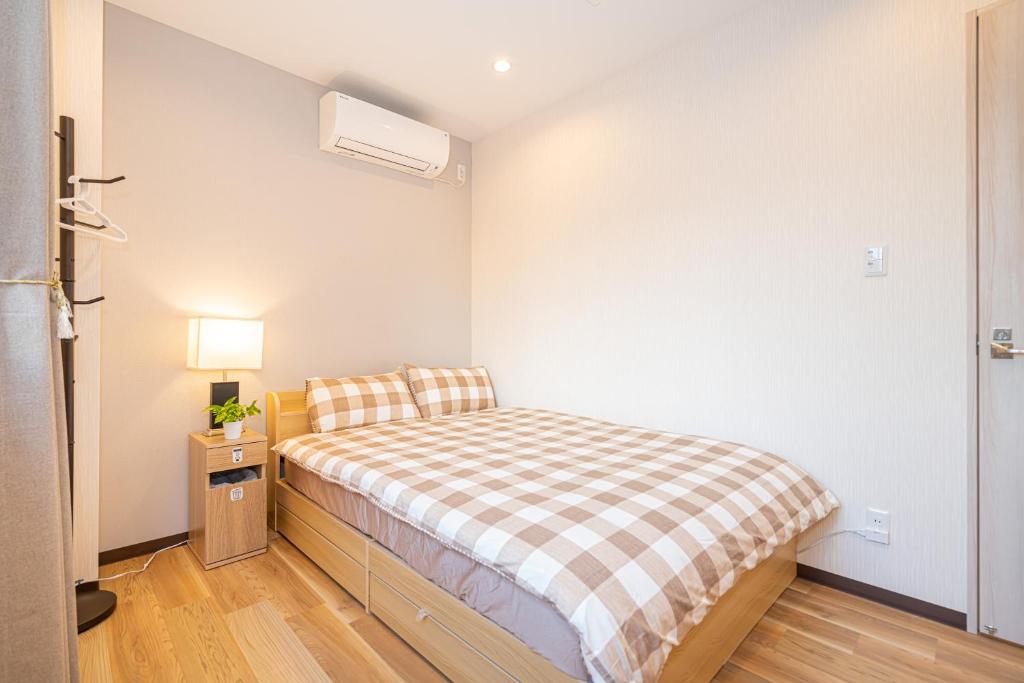 Asakusa,Ginza,Ueno,Skytree,Stn&Conv 1min ,Family suite,45 Mins to Airport,Kiyoka Villa 清禾客房内的一张或多张床位