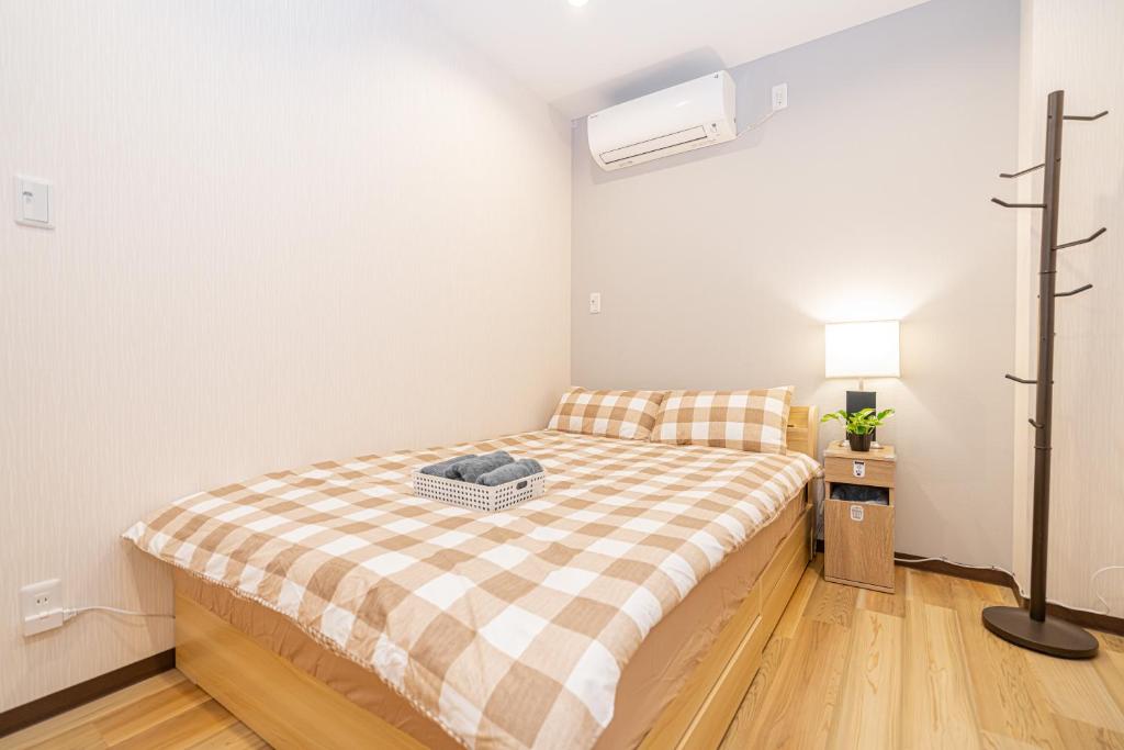 Asakusa,Ginza,Ueno,Skytree,Stn&Conv 1min ,Family suite,45 Mins to Airport,Kiyoka Villa 清禾客房内的一张或多张床位