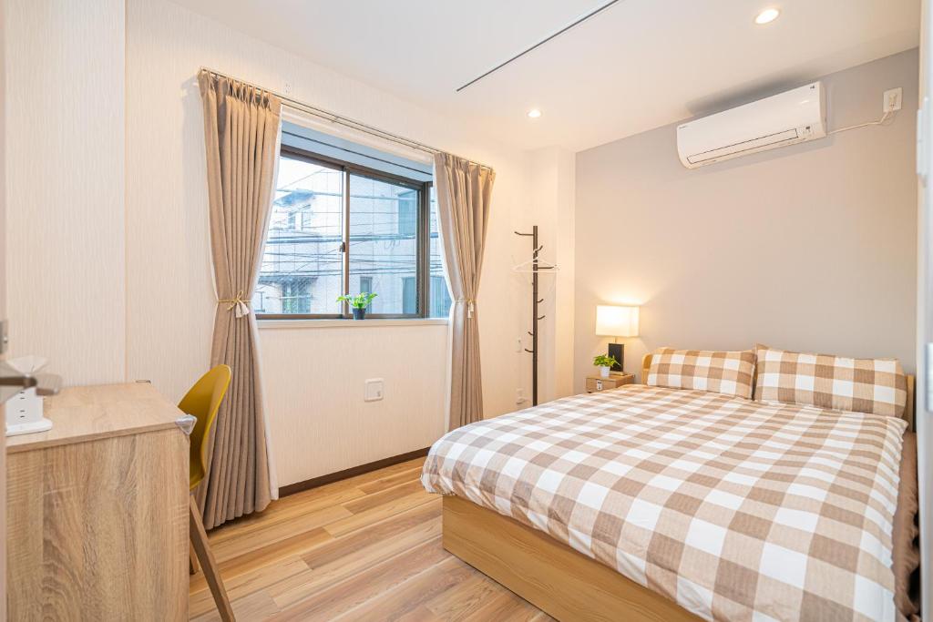 Asakusa,Ginza,Ueno,Skytree,Stn&Conv 1min ,Family suite,45 Mins to Airport,Kiyoka Villa 清禾客房内的一张或多张床位