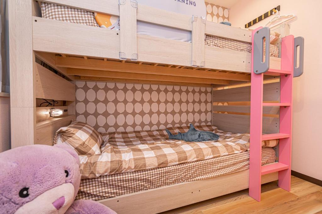 Asakusa,Ginza,Ueno,Skytree,Stn&Conv 1min ,Family suite,45 Mins to Airport,Kiyoka Villa 清禾客房内的一张或多张床位