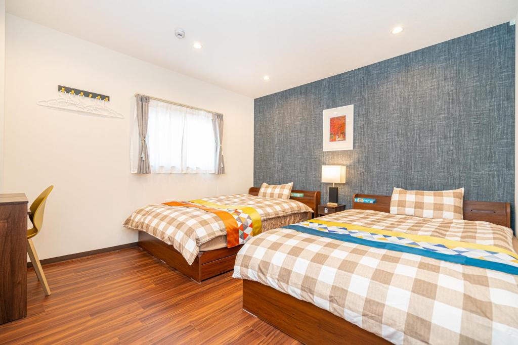 Asakusa,Ginza,Ueno,Skytree,Stn&Conv 1min ,Family suite,45 Mins to Airport,Kiyoka Villa 清禾客房内的一张或多张床位