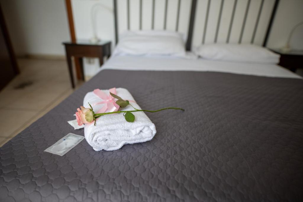 Postel nebo postele na pokoji v ubytování B&B Regina Carolina