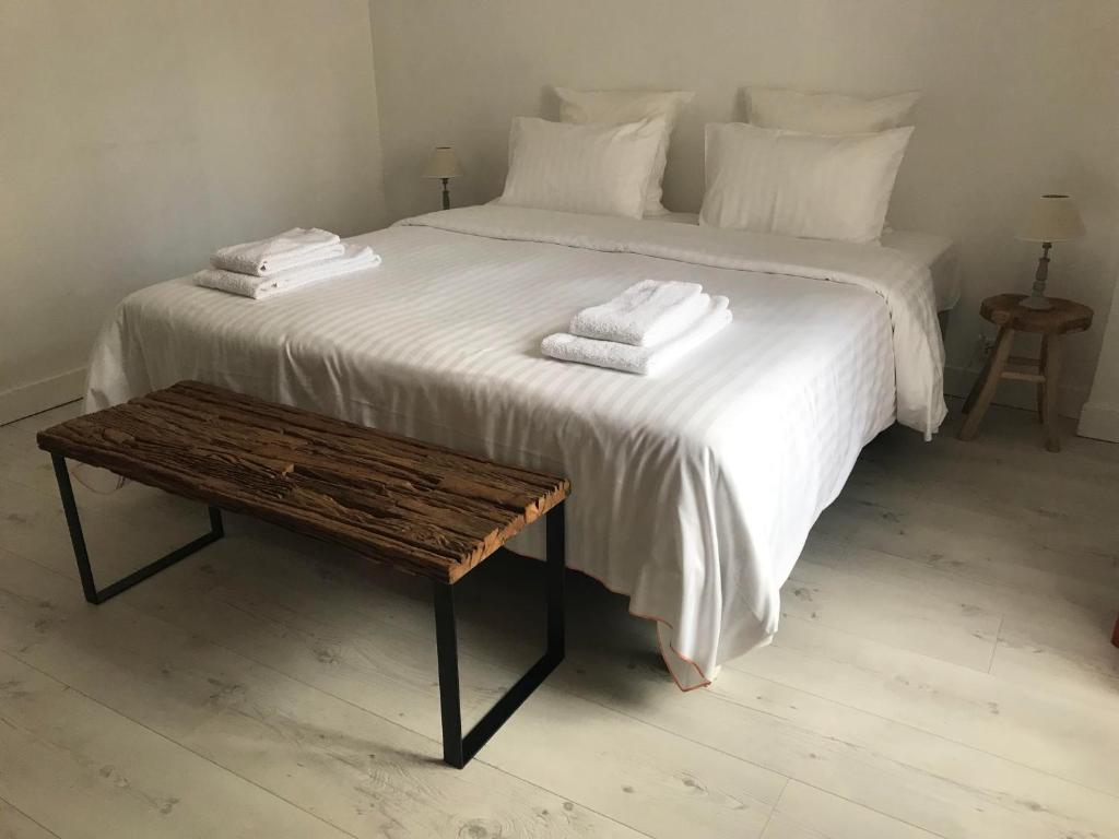Postel nebo postele na pokoji v ubytování Chablis Appart