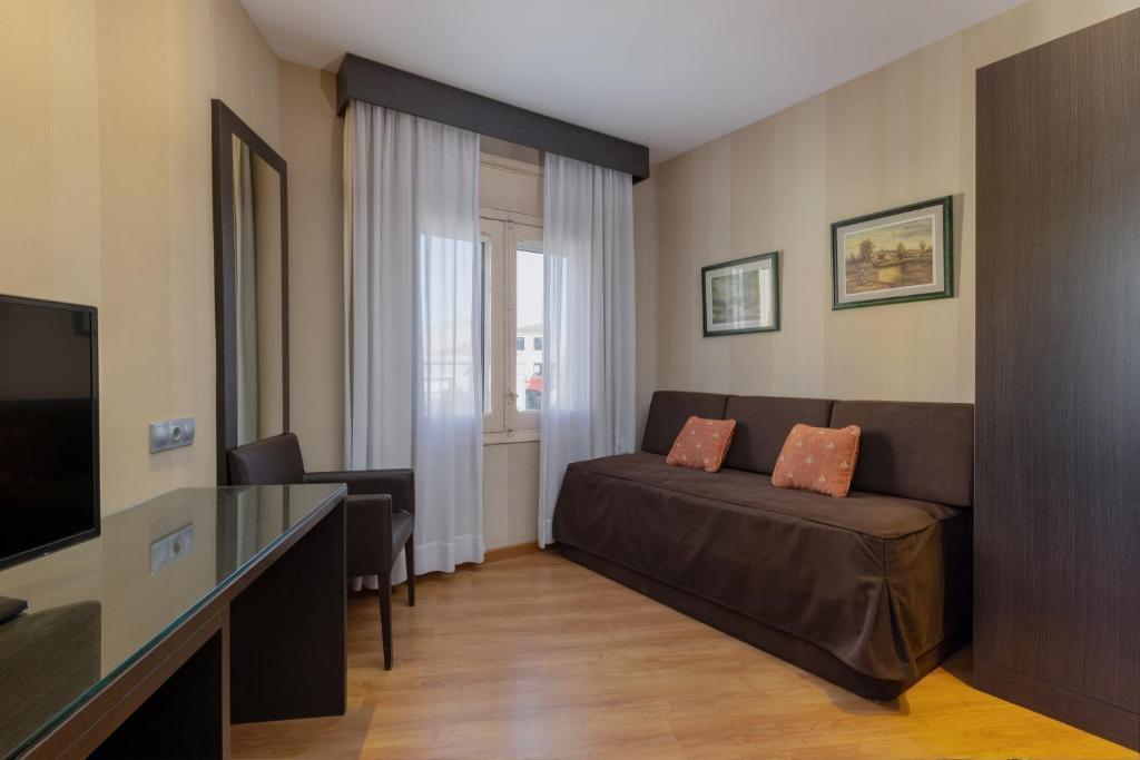 TV a/nebo společenská místnost v ubytování Hotel Casanova