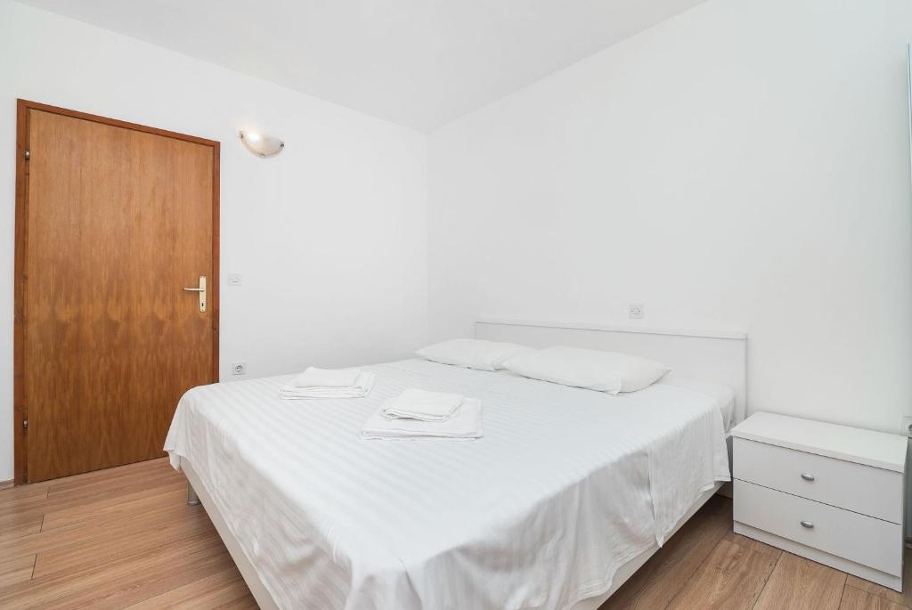 Postel nebo postele na pokoji v ubytování Apartment Ljuba