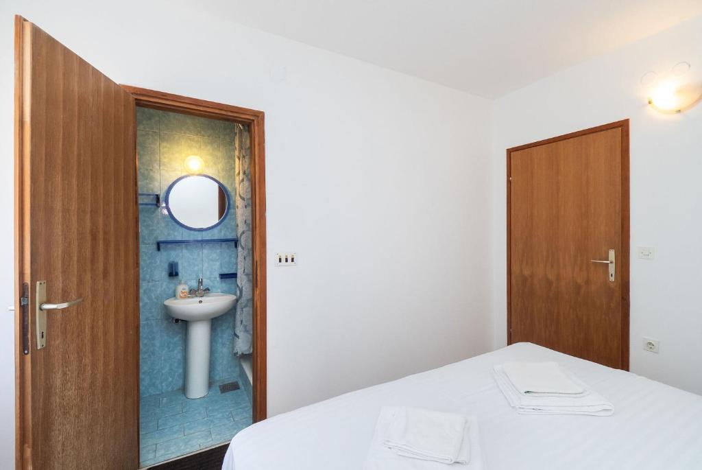 Postel nebo postele na pokoji v ubytování Apartment Ljuba