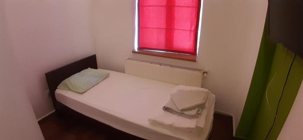 Postel nebo postele na pokoji v ubytování Central Accommodation budget by HR