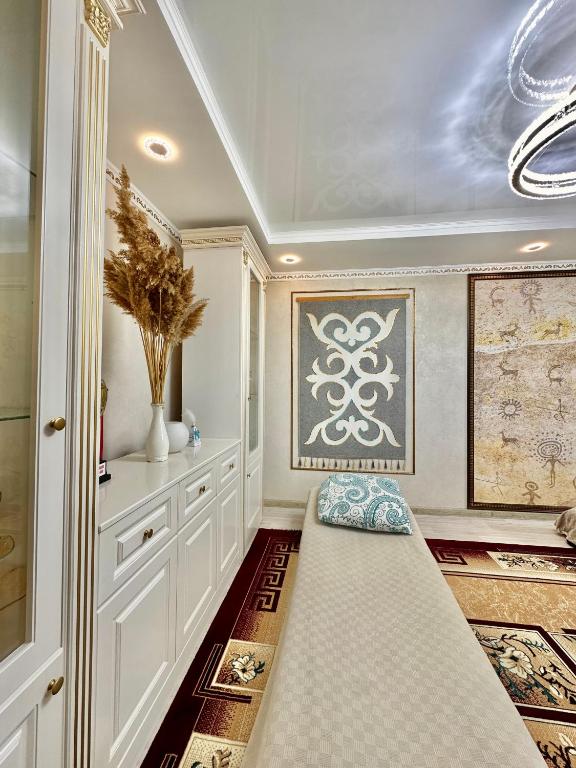 En eller flere senge i et værelse på Taizhan