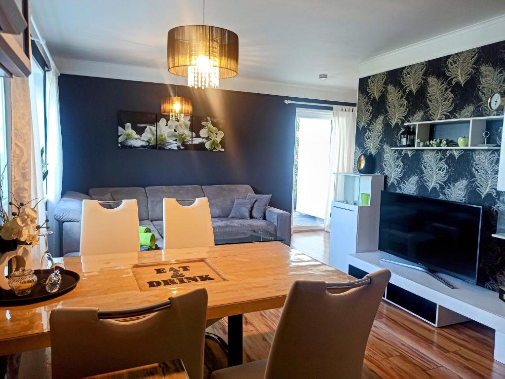 Et opholdsområde på Xenos Apartment