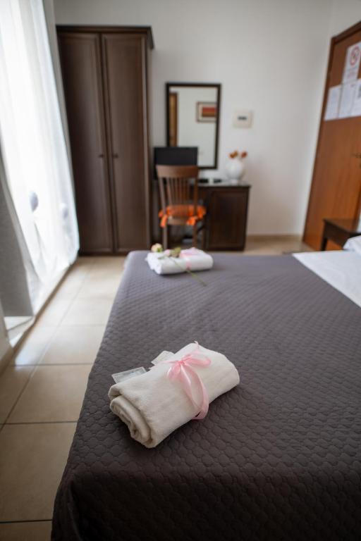 Postel nebo postele na pokoji v ubytování B&B Regina Carolina
