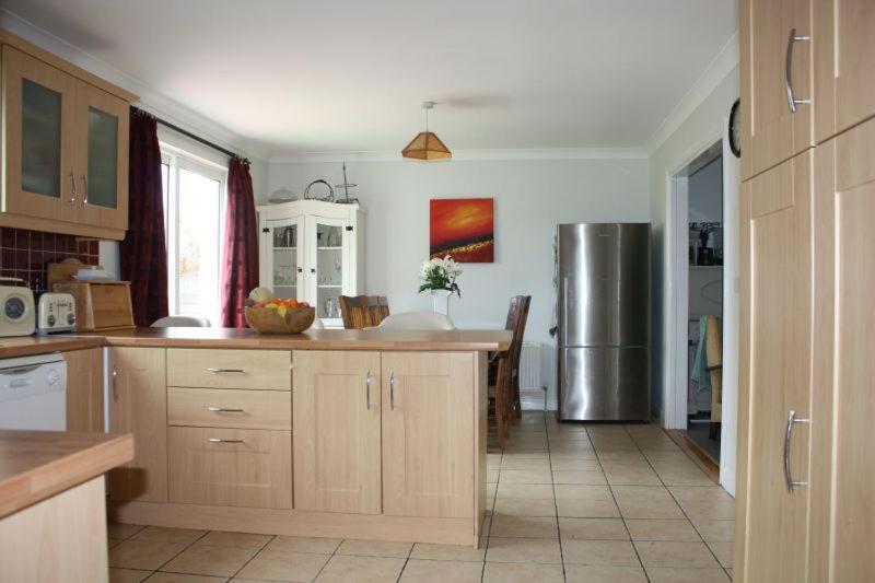 Kuchyň nebo kuchyňský kout v ubytování Oranmore Holiday Home