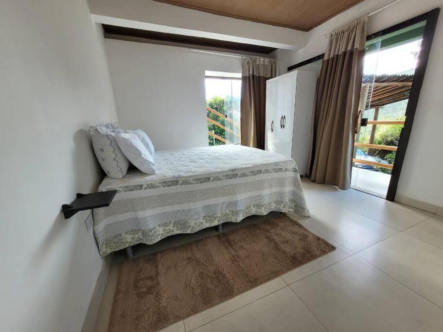 Postel nebo postele na pokoji v ubytování Casa verde