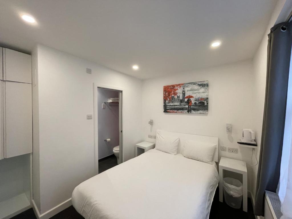 Letto o letti in una camera di Hotel Meridiana