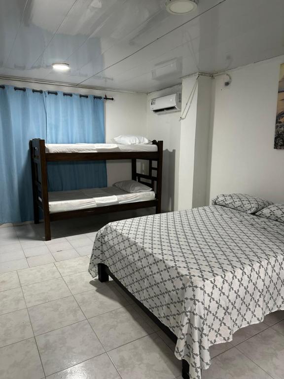 Postel nebo postele na pokoji v ubytování Jhonny Cay Collection Apartahotel