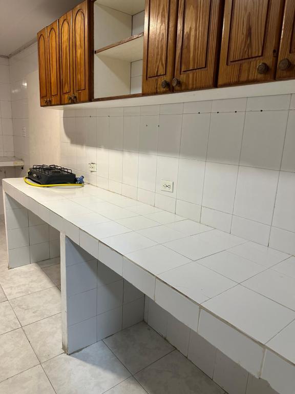 Kuchyň nebo kuchyňský kout v ubytování Jhonny Cay Collection Apartahotel