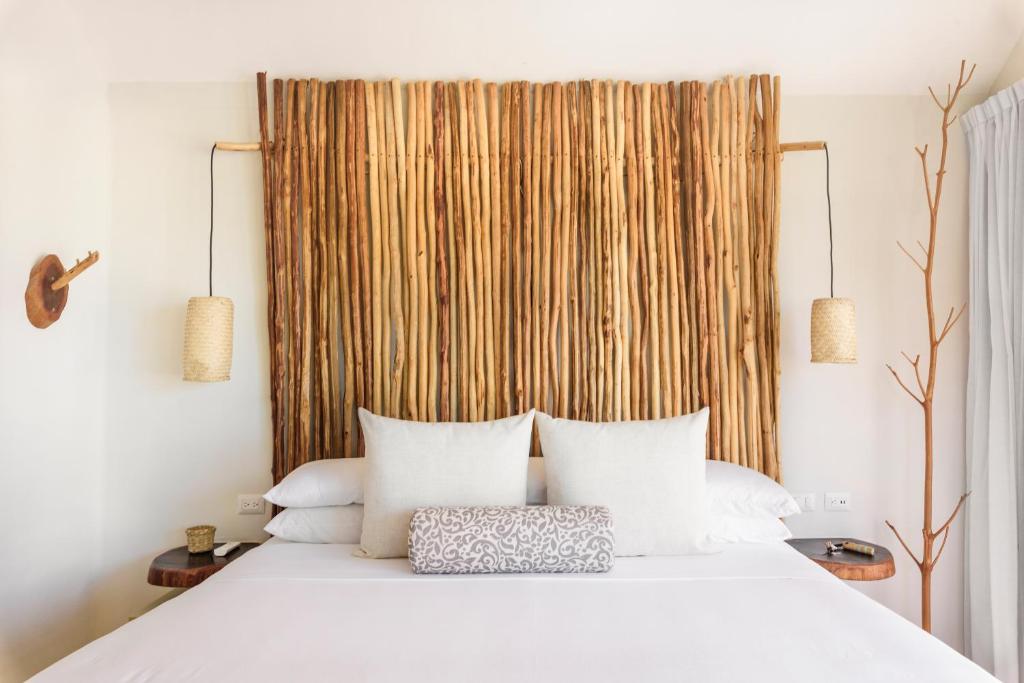 Postel nebo postele na pokoji v ubytování Hotel Villas Flamingos