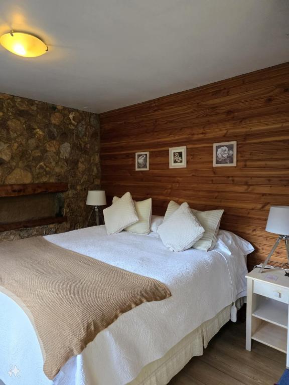 Postel nebo postele na pokoji v ubytování Hotel Boutique Terra Diaguita & Spa