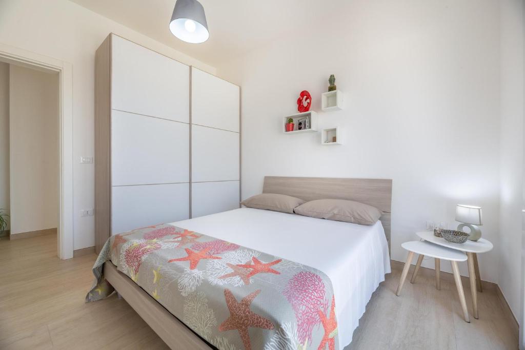 Postel nebo postele na pokoji v ubytování Villa Palibella