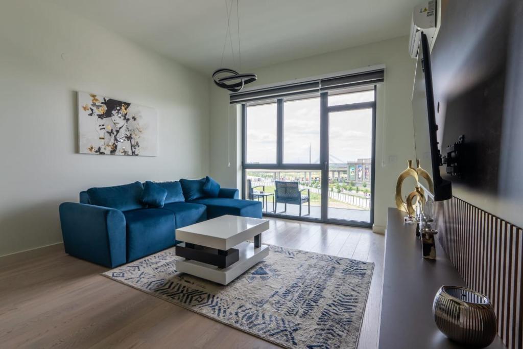TV a/nebo společenská místnost v ubytování Libera Luxe Residence