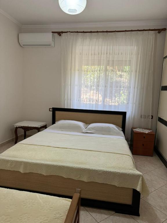 Postel nebo postele na pokoji v ubytování Isaraj Guest House