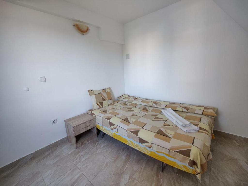 Postel nebo postele na pokoji v ubytování Hotel Joker