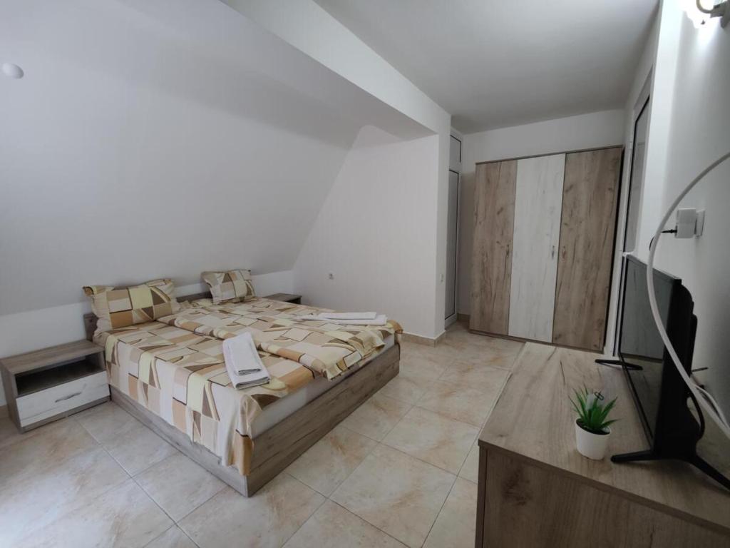 Postel nebo postele na pokoji v ubytování Hotel Joker