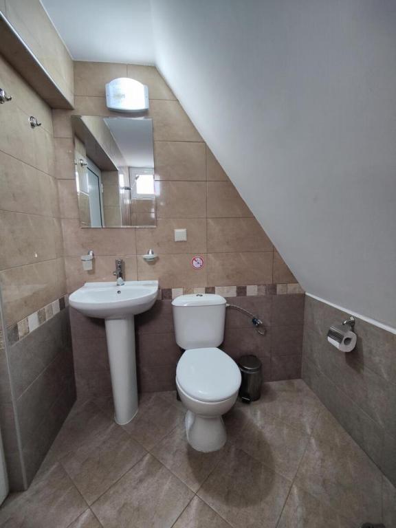 Koupelna v ubytování Hotel Joker