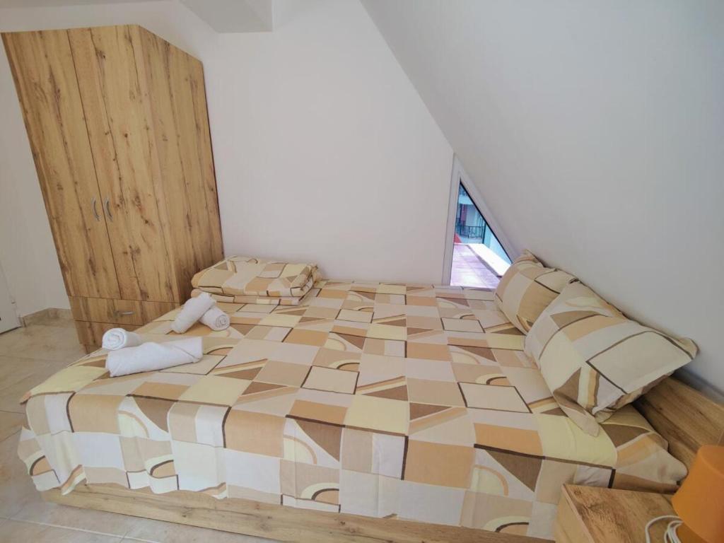 Postel nebo postele na pokoji v ubytování Hotel Joker