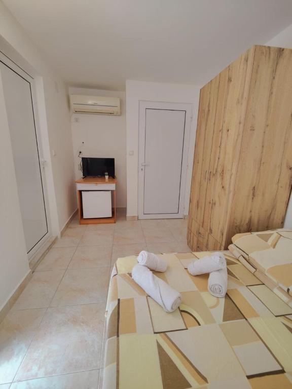 Postel nebo postele na pokoji v ubytování Hotel Joker