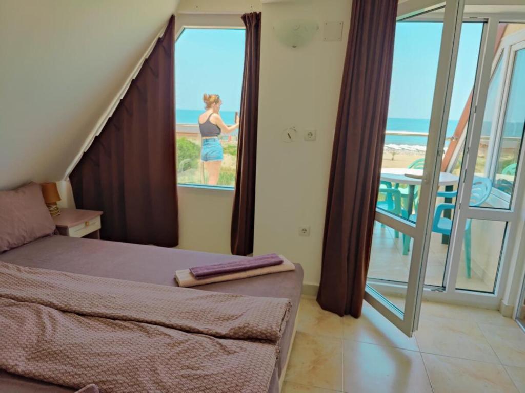 Postel nebo postele na pokoji v ubytování Hotel Joker