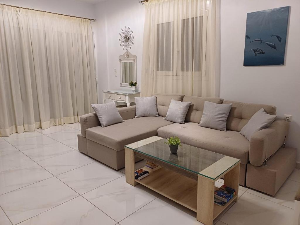 A seating area at Filocsenia luxury apartment at tsoutsouras