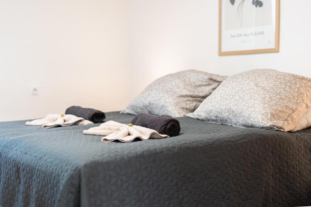Postel nebo postele na pokoji v ubytování revLIVING Apartments Gars am Kamp