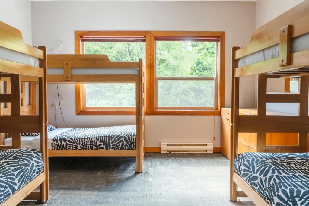 Postel nebo postele na pokoji v ubytování Whalers Guesthouse