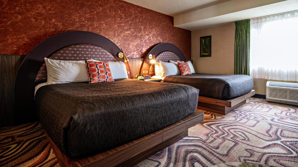 Postel nebo postele na pokoji v ubytování Hotel Zed Victoria