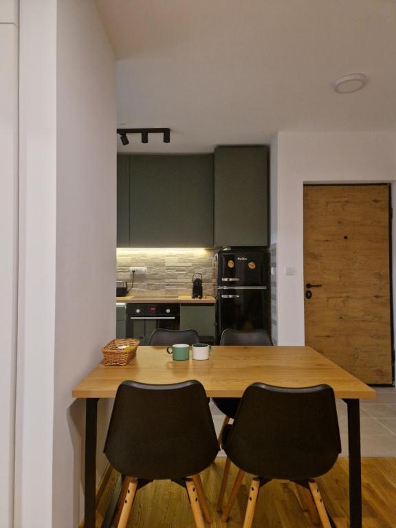 Kuchyň nebo kuchyňský kout v ubytování Divcinova - Apartman Gorski