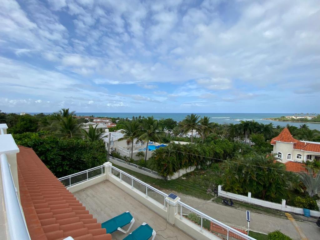 2 BR & 1WR Suite at Villa Costa Verde near Playa Cofresi, Puerto Plata with a pool, balcony, and a rooftop terrace